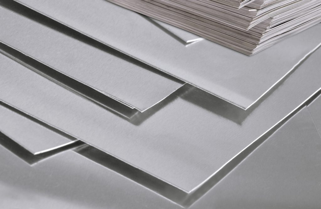 industrial aluminum metal pile. small square pieces.